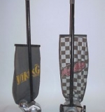 These are two fine examples of friction vacuum cleaners.  The vacuum on the left is called the Viking.  It was manufactured by The Vital Co.  I purchased it at a flea market many years ago.  The seller let me have it for five dollars because he couldn't test it, since the cord was missing!  The cleaner on the right is known as the Kwick-Kleen.  It was one of the early friction vacuums sold by Sears Roebuck in their well known mail order catalog.